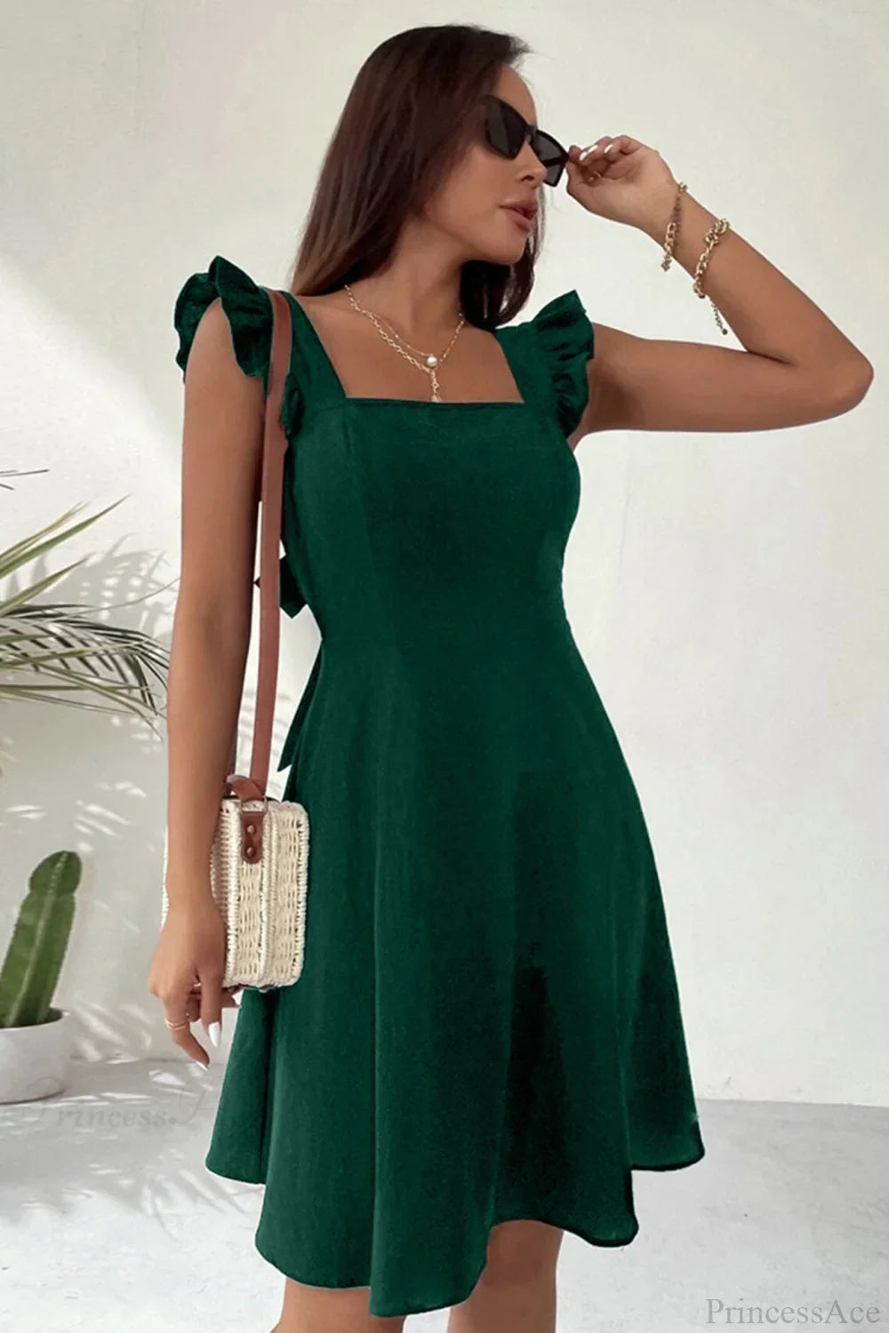 Bianca Sleeveless Mini Dress with Ruffle Tie-back