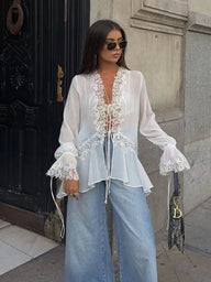 Emily koronkowy sweterek‑top